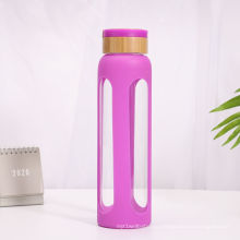 600ml Borosilicate Glass Water Bottle Bamboo Lid for Sale with Silicone Sleeve